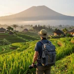 Bali tour experience at lush rice terraces, showcasing vibrant landscapes and early morning light.