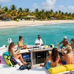 yacht rental punta cana - friends enjoying a luxurious yacht experience with cocktails under tropical sun